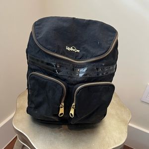 Kipling backpack with hot pink interior